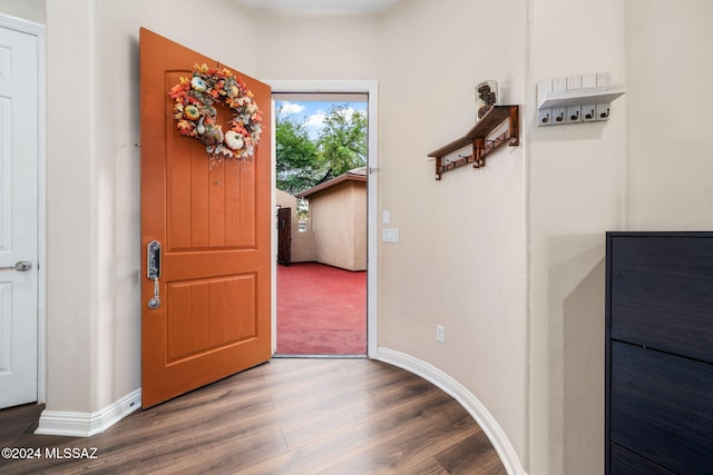 1220 W Calabria Ct, Tucson, AZ 85755 - foyer entrance with wood finished floors and baseboards