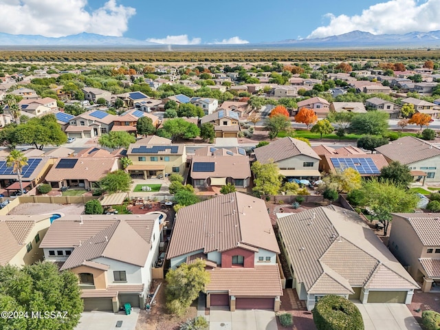 drone / aerial view featuring a mountain view