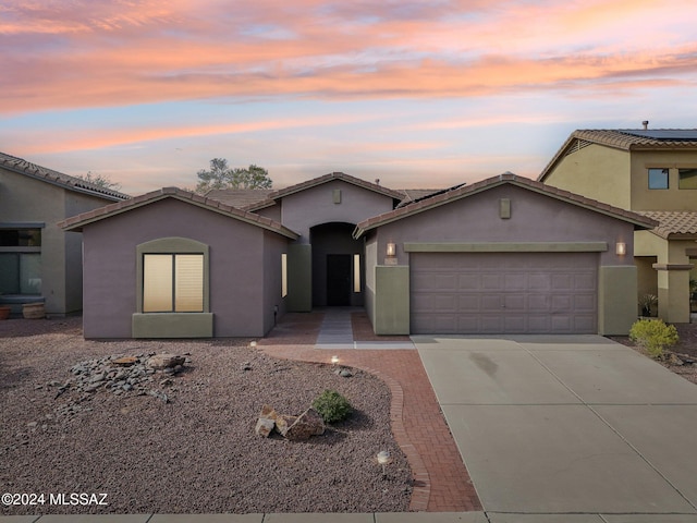 view of front of home featuring a garage