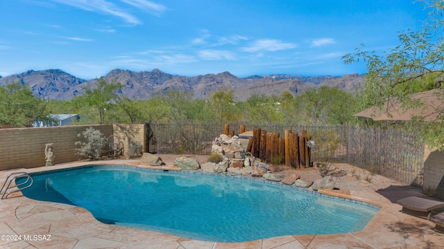 view of pool featuring a mountain view