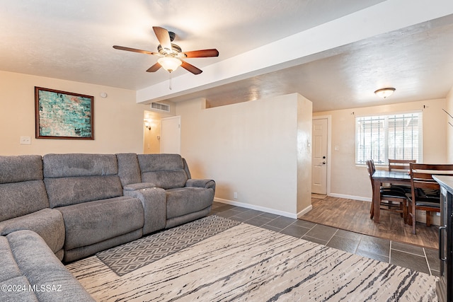 living room with ceiling fan