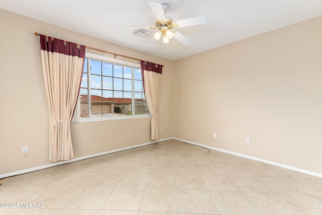 spare room featuring ceiling fan