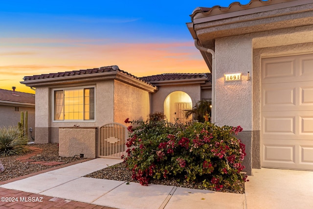 view of front of home featuring a garage