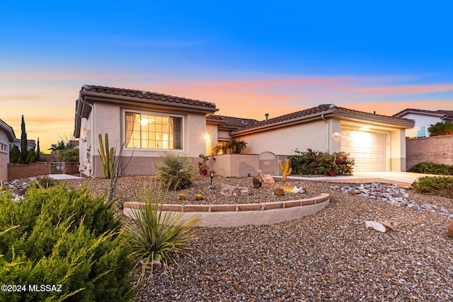 view of front of home featuring a garage