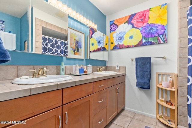 bathroom with vanity, backsplash, and tile patterned flooring