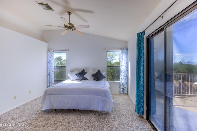 bedroom with ceiling fan, light carpet, and vaulted ceiling