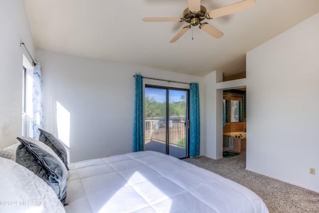 carpeted bedroom with connected bathroom, vaulted ceiling, access to exterior, and ceiling fan