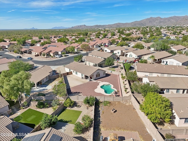 birds eye view of property featuring a mountain view