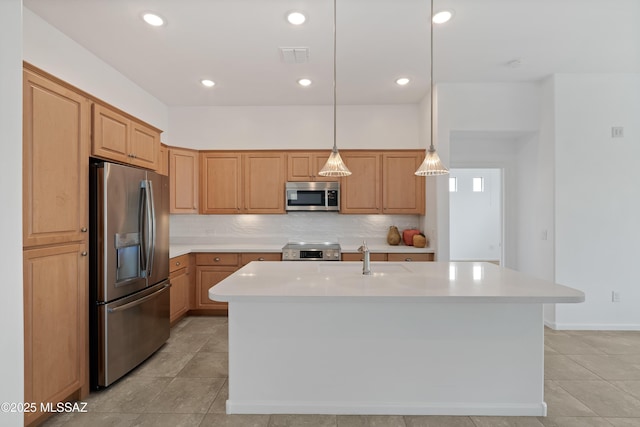 kitchen featuring stainless steel appliances, light countertops, decorative backsplash, recessed lighting, and light tile patterned floors