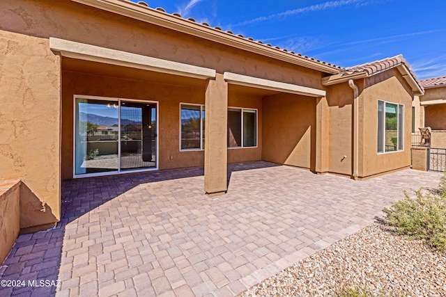 rear view of property with a patio area