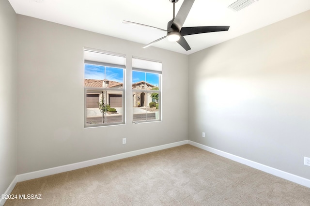 unfurnished room featuring carpet