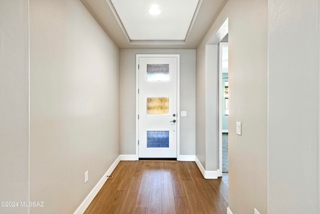 entryway with hardwood / wood-style flooring