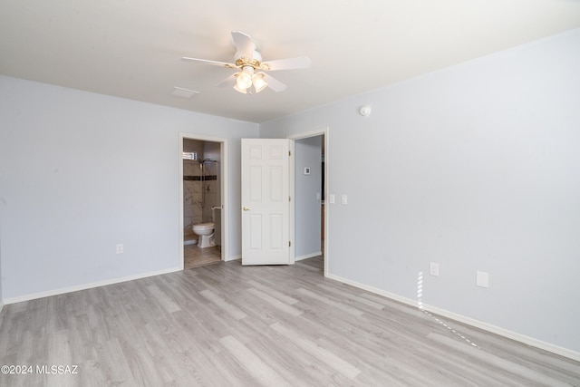 unfurnished room featuring ceiling fan and light wood-type flooring