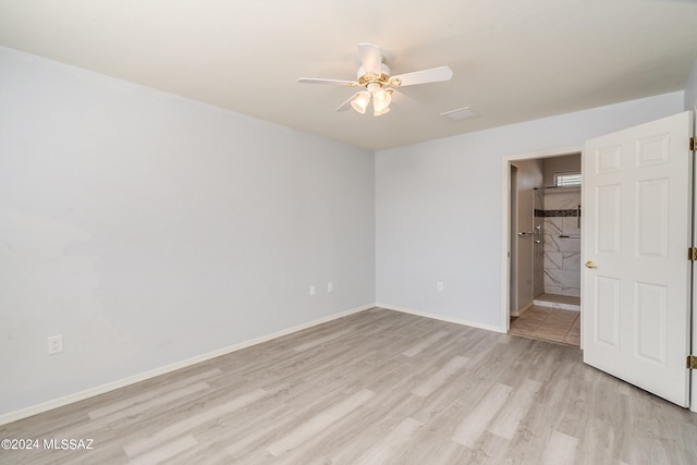 unfurnished bedroom featuring light wood-type flooring and ceiling fan