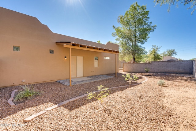 rear view of property with a patio