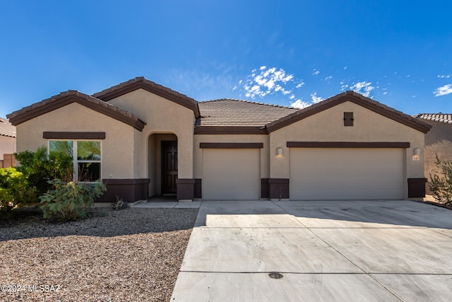 view of front of property with a garage