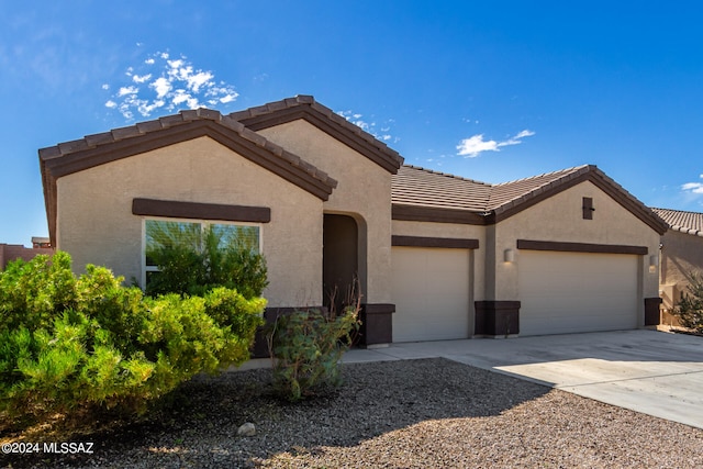 view of front of property featuring a garage