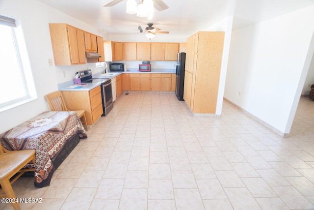 kitchen featuring sink, light tile patterned floors, ceiling fan, stainless steel appliances, and light brown cabinetry