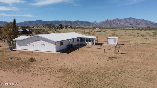 exterior space featuring a mountain view