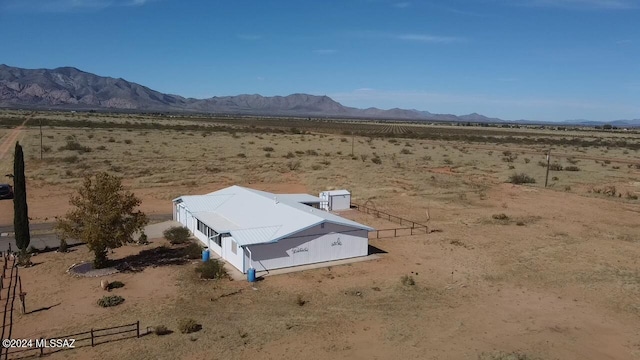 aerial view featuring a mountain view and a rural view