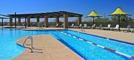 pool featuring fence