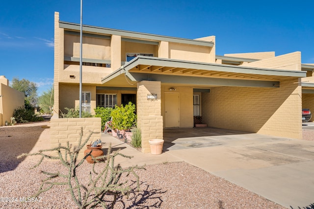 view of front of house with a carport