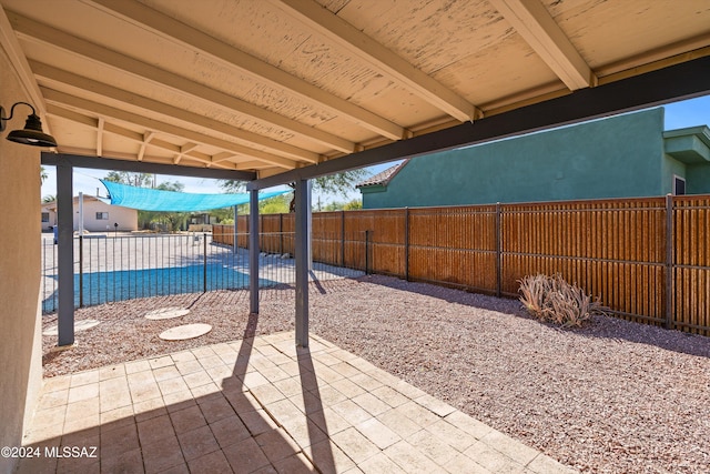 view of patio with a covered pool