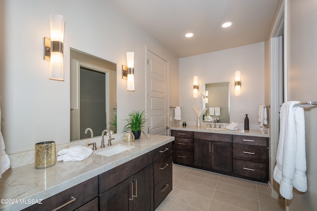 bathroom with vanity and tile patterned floors