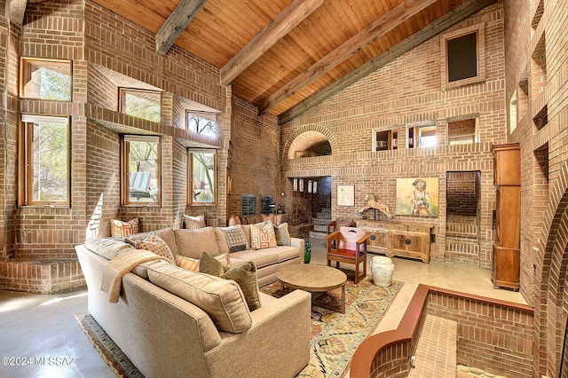 living room with high vaulted ceiling, brick wall, and wood ceiling