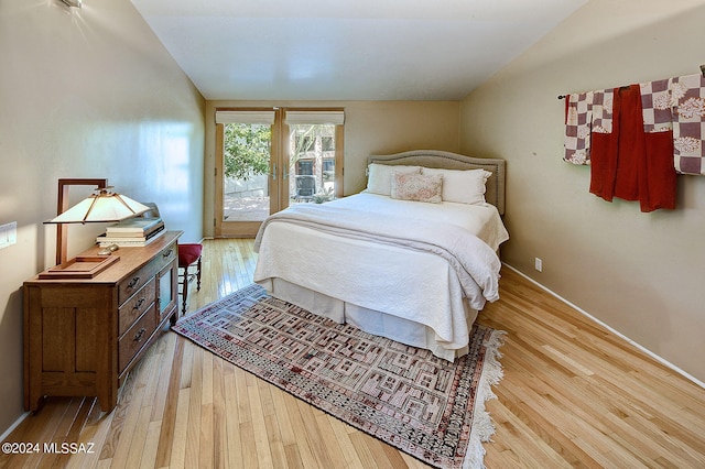 bedroom featuring light wood-type flooring