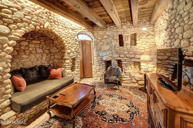 living room featuring wood ceiling and beamed ceiling