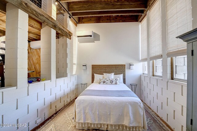 bedroom with beam ceiling