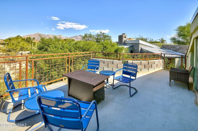 view of patio featuring a mountain view