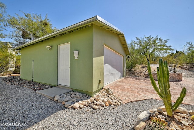 view of outdoor structure with a garage