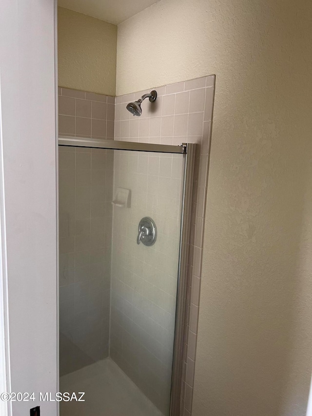 bathroom featuring walk in shower