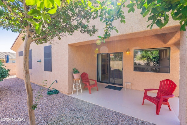 view of patio featuring fence