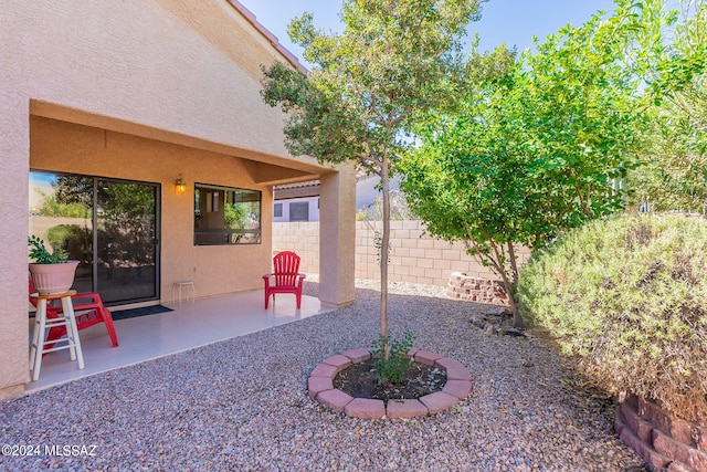 view of yard with a patio area and fence