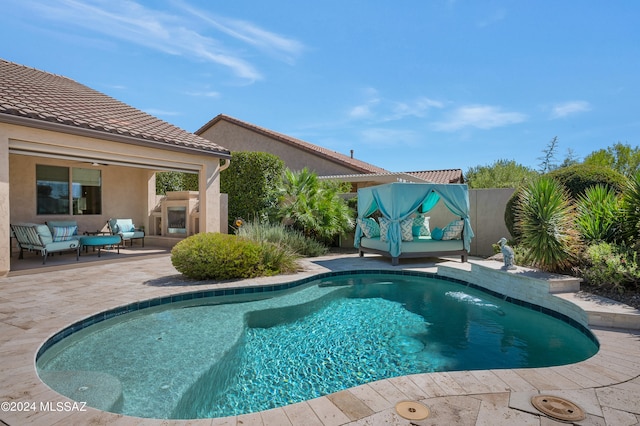 view of pool with a patio area