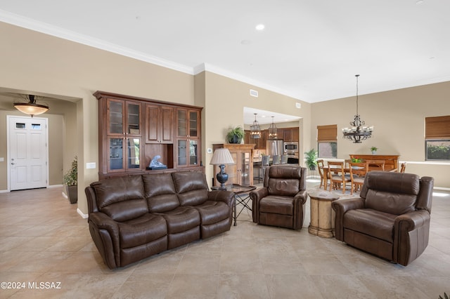 tiled living room featuring crown molding and an inviting chandelier