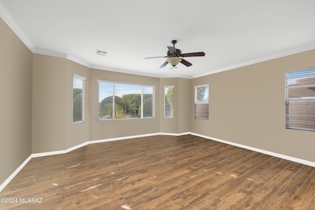 unfurnished room with dark wood-type flooring, ceiling fan, and ornamental molding