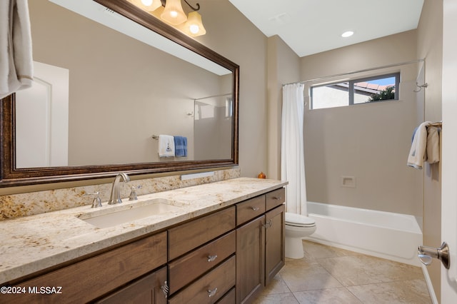 full bathroom with vanity, shower / tub combo, toilet, and tile patterned floors