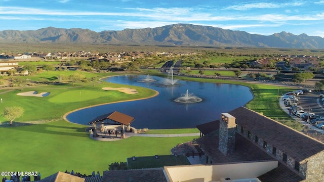 view of community featuring a water and mountain view