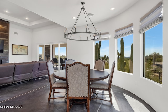 dining area with a chandelier