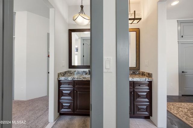 bathroom featuring vanity and tile patterned flooring