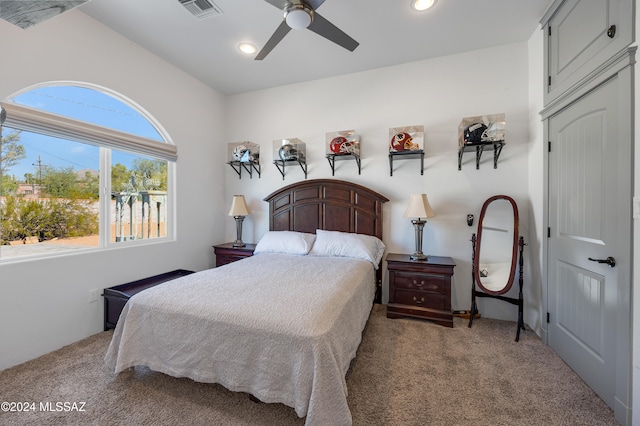 carpeted bedroom featuring ceiling fan