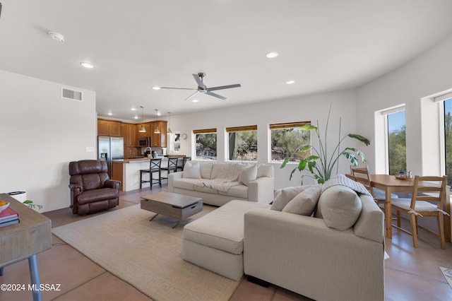 living room with ceiling fan