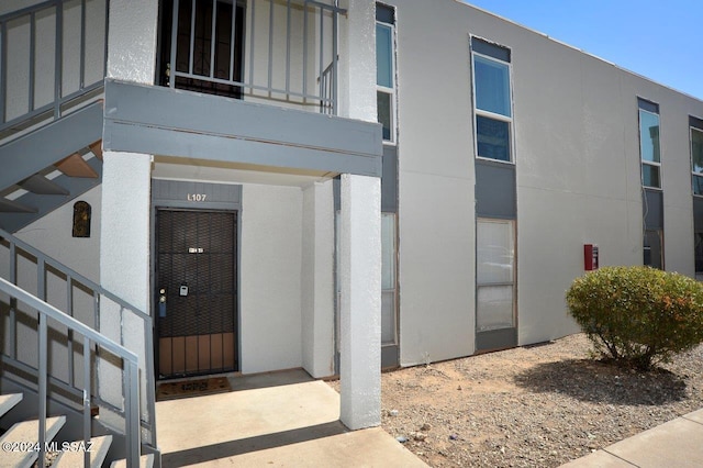 doorway to property featuring a balcony