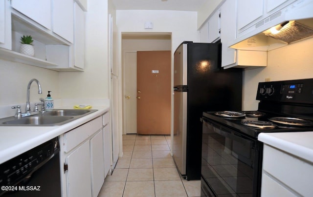 kitchen with sink, black appliances, white cabinets, and light tile patterned floors