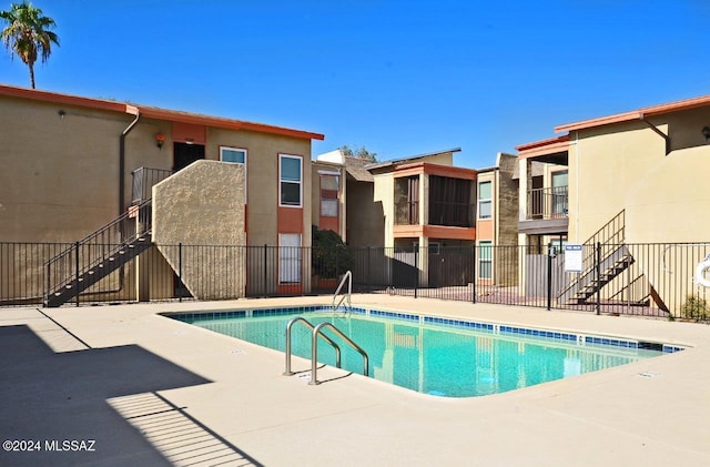 view of pool featuring a patio