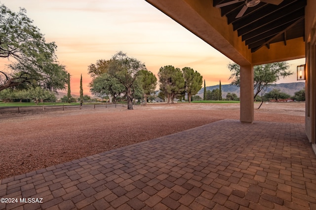 view of home's community with a patio area and a mountain view